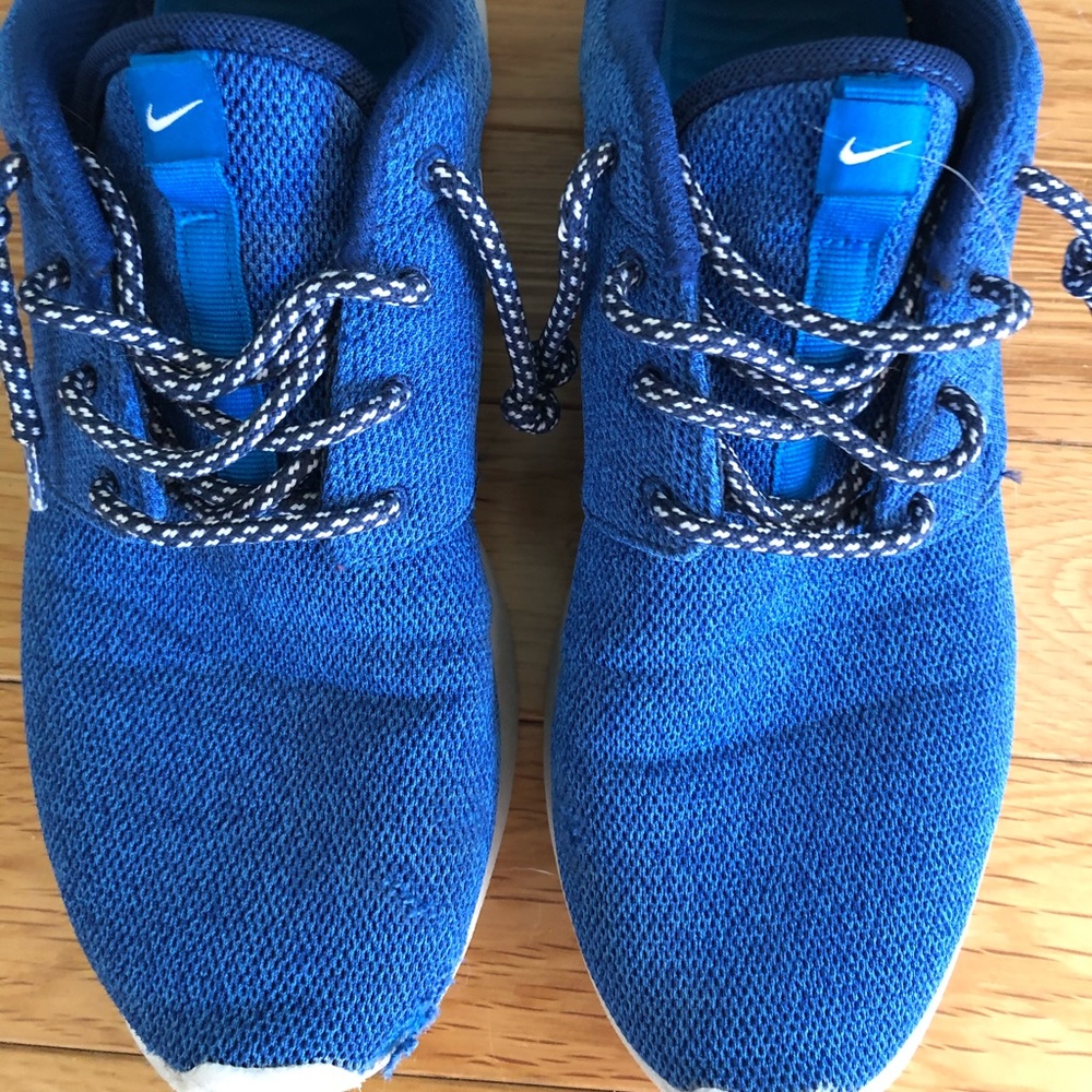 Bright blue Nike shoes